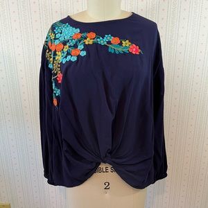 Cute embroidered top. WAaaaay cuter on!!